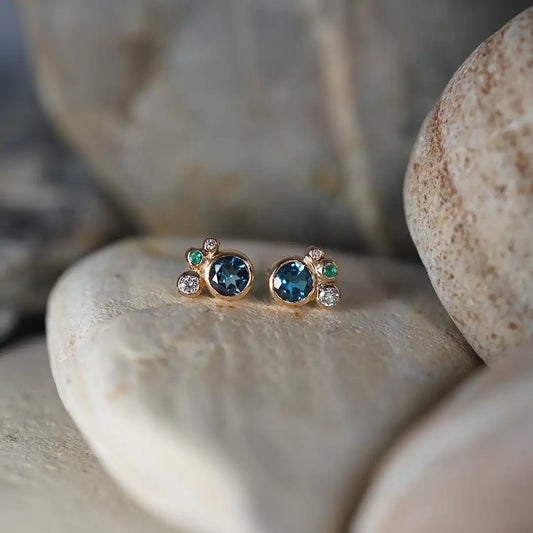 18k Gold Sky Topaz, Emerald and Diamond Earrings